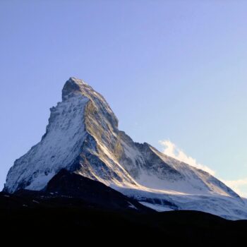 summit and a blue sky