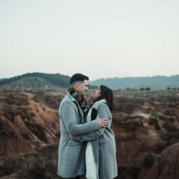 Portrait of a young couple in a rural area in winter