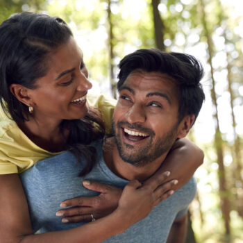 Man Giving Woman Piggyback