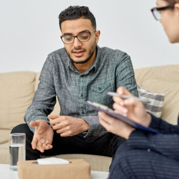 Consulting Patient at Modern Office