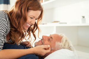 Attractive older couple in bed
